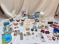 Full lot overview showing all miniature furniture, tins, craft packs, gazebo, wagons, bike, skateboard, hardware organizers