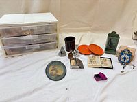 Full lot overview including plastic drawers and assorted items