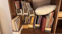 Wide view of magazines in holders with pillow