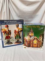 Boxes for nutcracker candleholders set and Heartland Valley Village lighted house