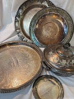 Group shot of all five silver-plated serveware pieces