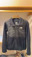 The North Face fleece jacket hanging front view
