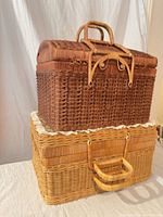 Two wicker baskets stacked showing overall size and colour contrast
