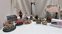 Full group shot of all miniature carousel, porch and accessory pieces