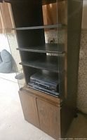Full view of cabinet showing glass doors and lower wood doors