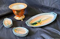group shot of all eight lustreware pieces