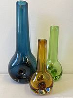 all three coloured glass vases