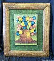 Front view showing painting, mat and wood frame