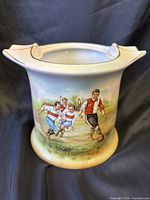 Front view showing soccer player scene and rim rests