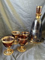 Group view of decanter and four glasses