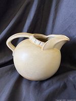 Left side view of round Frankoma Woodland Moss pitcher
