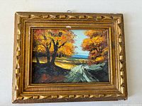 Front view of framed oil painting