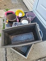 Group of planters stacked together at doorway