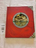 Front cover showing title, embossed design and cabochons