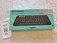 Retail box front showing Logitech K380 keyboard image and branding