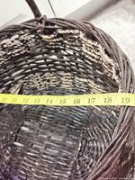 Top view of larger basket with tape showing 19 in diameter