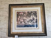 Full view of framed print on wall