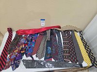 Overview of all neckties laid on table