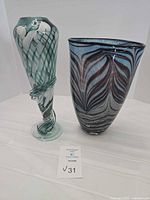 Both art glass vases side by side showing overall form and patterns