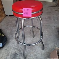 Full view red vinyl seat chrome frame bar stool
