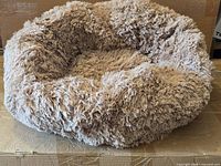 Top view of shaggy camel round pet bed
