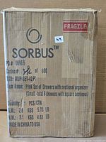 Front of boxed Sorbus pink acrylic organizer showing branding and item details