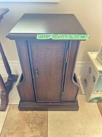 Front view showing rattan door panel, overall size reference label