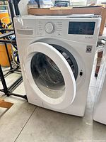Front view of LG WM3900CW washer with door open and control panel visible
