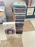 Entire stack of CDs beside Patsy Cline box set