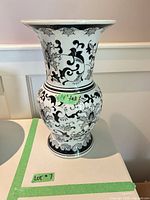 Full view of vase showing shape and pattern with height tag