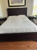 Quilt spread on queen bed, full view