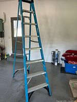 Full front view of 8 ft Werner fiberglass ladder
