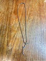 Full view of necklace showing chain and pendant