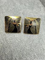 front view of both enamel bird motif earrings