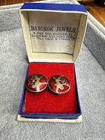 earrings in open Bangkok Jewels box