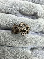 Front view of textured silver-tone ring