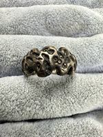 Front angled view of textured sterling silver ring