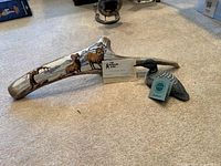 Antler wall art, loon decoy, provenance card, overall view