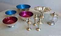 Group shot of all eleven sterling pieces