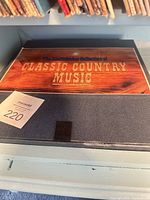 Denim-texture storage box labeled "The Smithsonian Collection of Classic Country Music"
