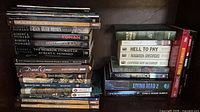 Overall view of both stacks of books on shelf