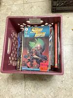 Top view showing Starship Troopers: Insect Touch on stack of comics