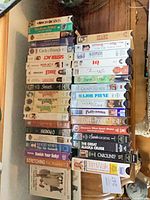 full stack of VHS tapes on shelf