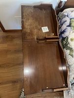 Top view of both nightstands showing finish wear