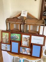 Pair of wall shelves and front view of collage frame