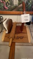 All four wooden kitchen items displayed together