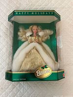 Front view of boxed Happy Holidays Barbie