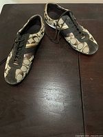 Top view of both sneakers showing uppers and lace area