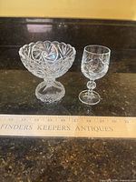 Front view of compote and cordial glass side by side
