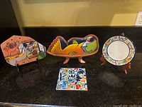Group shot of all four ceramic pieces on counter